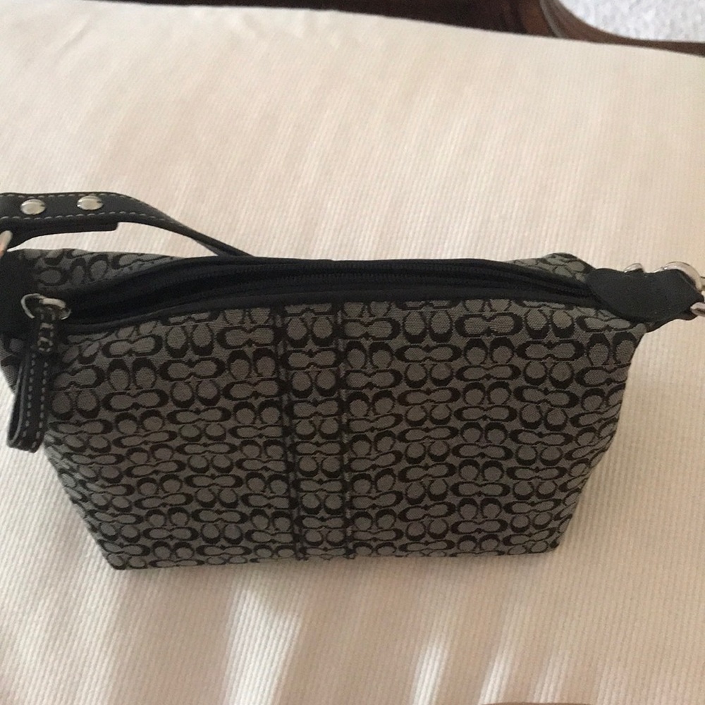 Mini black and white coach purse